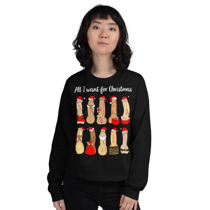 Person wearing a black Christmas sweatshirt with ten festive penis illustrations and sample 'All I want for Christmas' text.