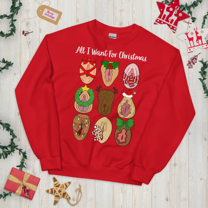 Red crewneck sweatshirt laid flat with nine festive vulva illustrations and sample 'All I Want For Christmas' text.